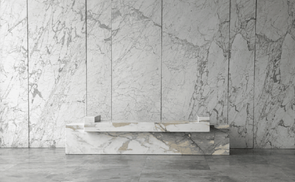 Custom Stone Reception Desk in Boutique Hotel